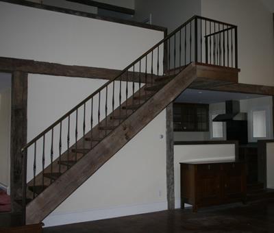 Steel Railing with faux oil rubbed bronze finish and real antiqued brass cap