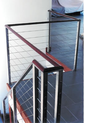 Stainless steel cable railing<br>with mahogony cap