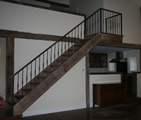 Steel Railing with faux oil rubbed bronze finish and real antiqued brass cap